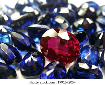  lot of red ruby and blue sapphire precious gemstone oval shape cutting for design jewellery.  - Shutterstock ID 1991672054