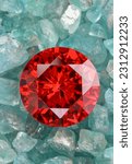 Red ruby diamond diamond on placed on a pile of raw sky blue gemstones.jewelry are lovely present for valentine daycolorful raw stone background.lived a life of luxury. 