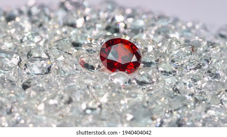 Red ruby diamonds are placed on a pile of white diamonds And keep turning. video 4k resolution shoot in studio