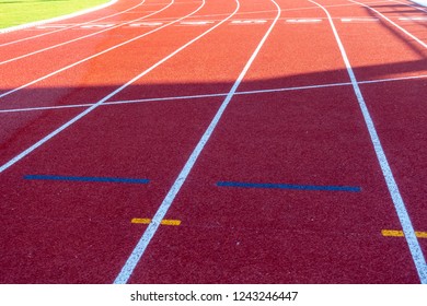Red running track in stadium 