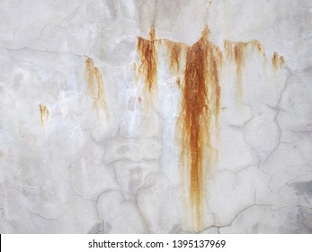 Red Rust Leaks On Concrete Wall Texture.
