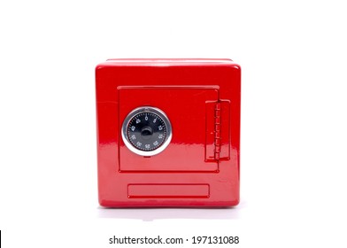 A Red Safe With A Black Lock Dial.