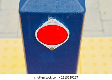 Red Safety Reflector On Blue Post In Parking Lot Malibu California