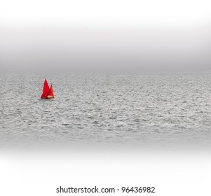 Red Sail Boat On The Sea