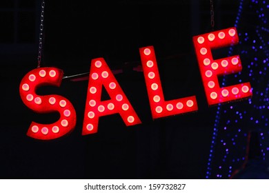 Red Sale Advertisment Sign In Window