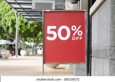 Red Sale Sign Outside Store