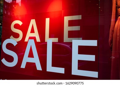 red sale sign in a shop january sales - Shutterstock ID 1629090775