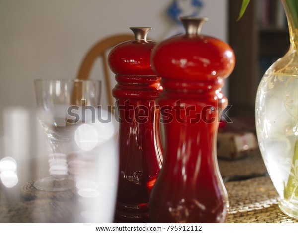 red salt and pepper mills