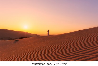 The red sand dunes in Mui ne, Vietnam is popular travel destination with long coastline - Powered by Shutterstock