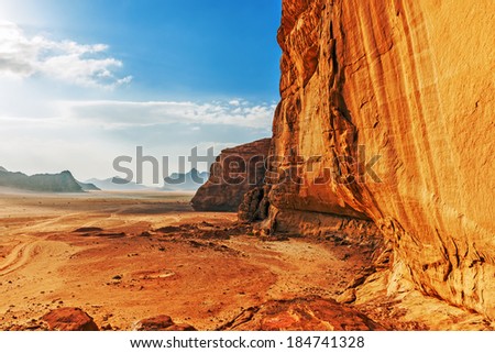 Red sandstone cliff in the desert of Wadi Rum, Jordan, Middle East