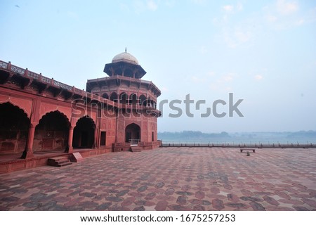 Red sandstone platform next to Yamuna River at Taj Mahal Complex in Agra, India.