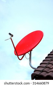 red satellite on roof