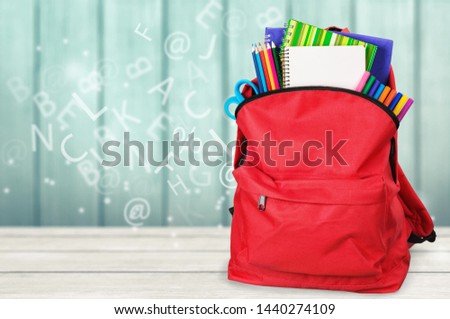 Red School Backpack on background.