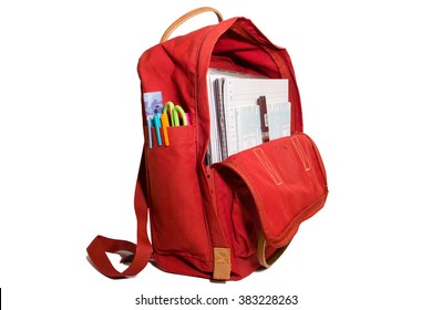 Red School backpack and school supplies (paper, pen) on Isolated white background