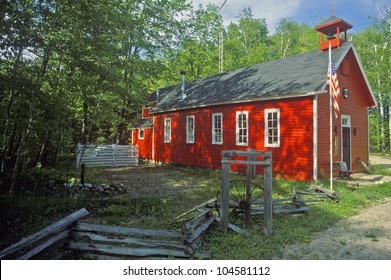 Red Schoolhouse In Rustic Setting, MI