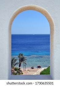 Red sea coral reef and beach through the window, Sharm-el-Sheikh, Egypt, June 2011