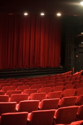 empty red velvet seats in cinema, an Architecture Photo by darksoul72