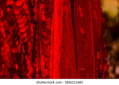 Red Sequins Pattern. Sparkling Sequins Background. Red Sequin Fabric For Background. Rectangular Red Shiny Fabric With Sequins, Christmas Background. Sequins On Fabric, Red Beads. Fashion Fabric