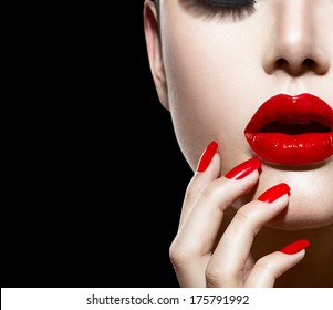 Red Sexy Lips and Nails closeup. Open Mouth. Manicure and Makeup. Make up concept. Half of Beauty model girl's face isolated on black background