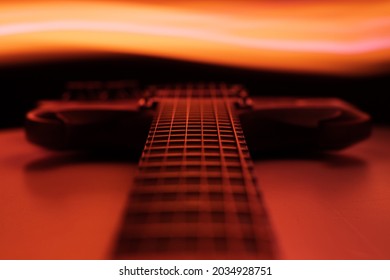 Red Sg Guitar Surrounded By Bands Of Light