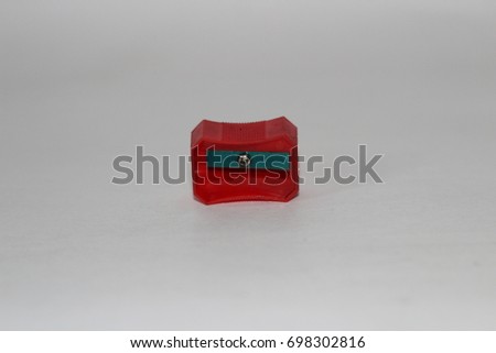 Red sharpner on white background