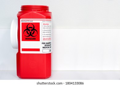 Red Sharps Biohazard Container On White