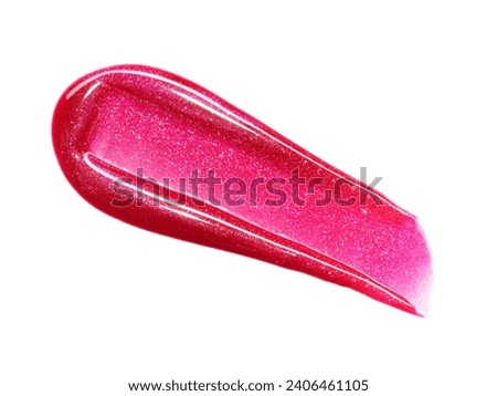Red shimmering lipgloss texture isolated on white background. Smudged cosmetic product smear. Makup swatch product sample