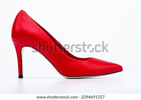 Red shoe for women. Beauty and fashion concept. Fashionable women shoes isolated on white background. Red high heel women shoes on white background.