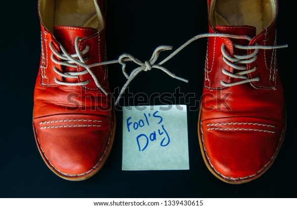 red shoes with black laces