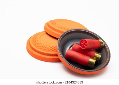 Red Shotgun Shell And Clay Pigeon Target On White Background , Gun Shooting Game