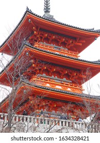 The Red Shrine In The Winter And Different  People In The Same Place