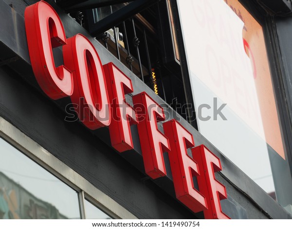 red sign by text, marked\
COFFEE