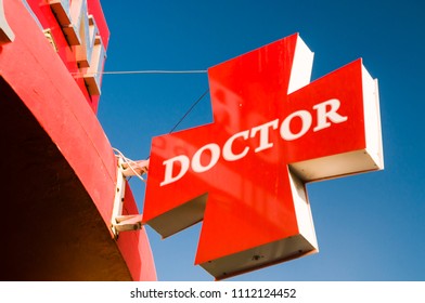 Red Sign Outside A Doctors Surgery