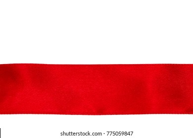 The Red Silk Ribbon Is Evenly Stretched On The White Surface.