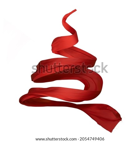 Red silk twisted piece of textile, Curl in spiral flying cloth fabric. Real Shoot.  Image isolated on a white background.