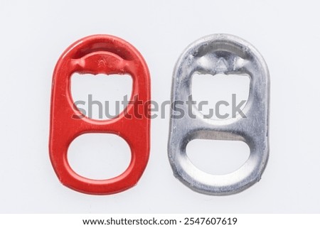 Red and Silver Pull Tabs for Beverage Cans