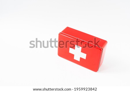 Red simplistic first aid box, white  background