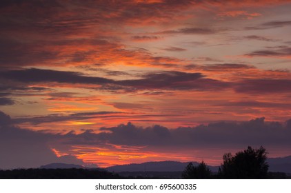 red sky with dramatic sunset clouds