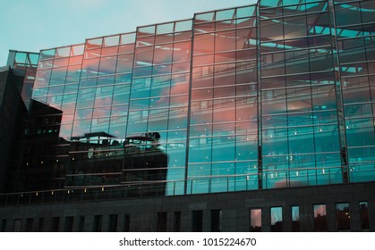 Red sky reflection on glass office builiding Nile house at Karlinske namesti in Prague 