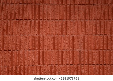 Red slate texture.Pattern with
reddish cracks. Red wavy texture wall. Cladding to cover the red brick wall texture