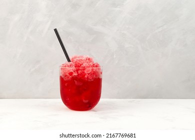 Red Slushie. Sweet Shaved ice. Spanish fruit granizado drink. Refreshing summer iced drink. - Shutterstock ID 2167769681