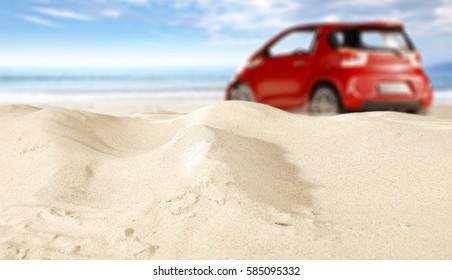 Red Small Car On Beach And Sand Background 