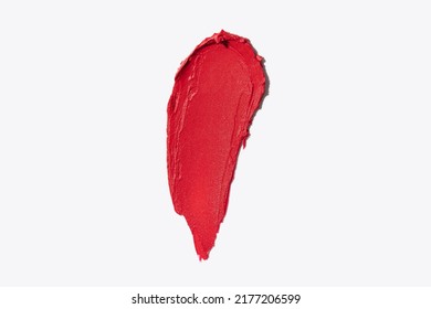 Red smear swipe on white background texture close up macro shot horizontal and vertical beauty lipstick swatch