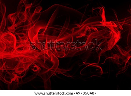 Red smoke abstract on black background, fire design and darkness concept