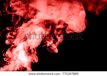 red smoke isolated on a black background. fractal. spiral.