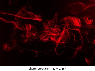 Red Smoke On Black Background