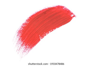 Red smudged lipstick stroke sample isolated on white background. Beauty face make up, close up. Makeup creamy texture. Beauty product smudge closeup. Liquid beauty cosmetics