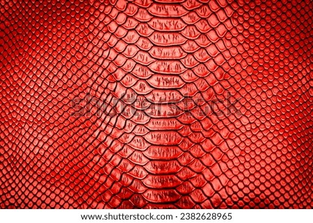 Red snake skin texture pattern can see the surface details use for background