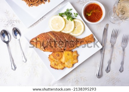 Red Snapper Haitian Food, Antilles Cuisine, Caribbean Dining, White tablecloth 