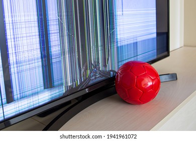 Red Soccer Ball Hit The TV Screen And Crashed It